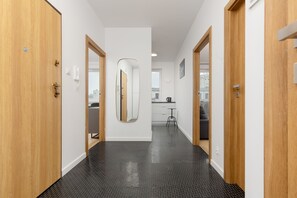 55-inch flat-screen TV with digital channels - Minimalist Apartment in Łódź by Renters (Lodz)