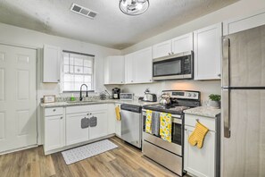 Microwave, oven, stovetop, dishwasher - Georgia Getaway w/ Fireplace & Fenced-in Yard (Conyers)