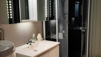 Shower, towels, toilet paper
