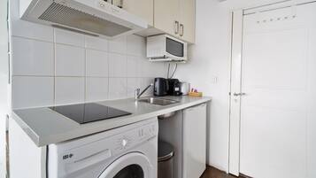 Fridge, microwave, stovetop, coffee/tea maker