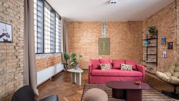 Comfort Duplex | Living area | Flat-screen TV