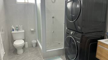 Shower, hair dryer, towels, soap