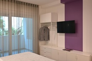 1 chambre, coffres-forts dans les chambres, fer et planche à repasser