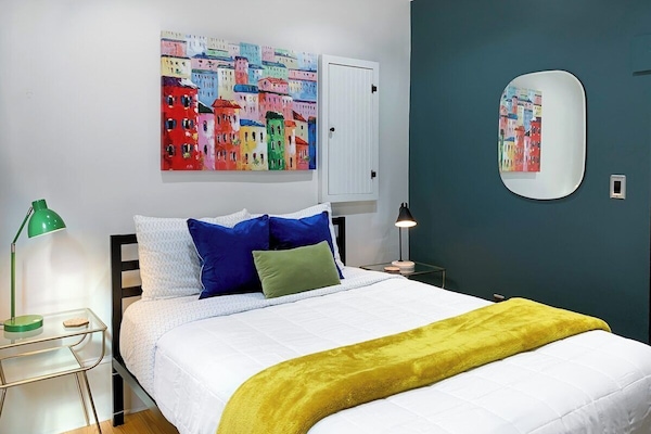 Relax and unwind in this quaint bedroom after your long day of exploring Savannah!