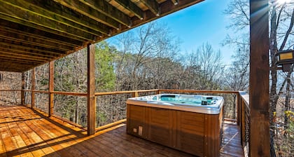 3 mi. from Dollywood! Stylish cabin w/ game room & hot tub, close to everything!