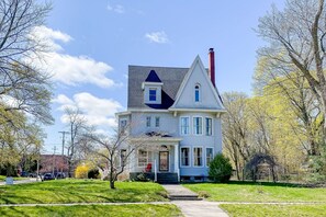 Exterior - Historical dog-friendly home with fenced yard, grill, Ping-Pong, fireplace, & AC (Manistee)