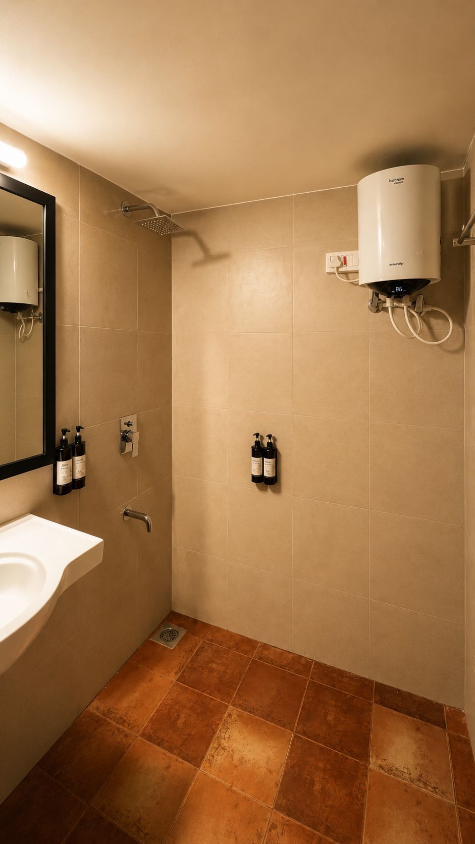 A bathroom with a white sink, a mirror, a shower, and two bottles of shampoo.