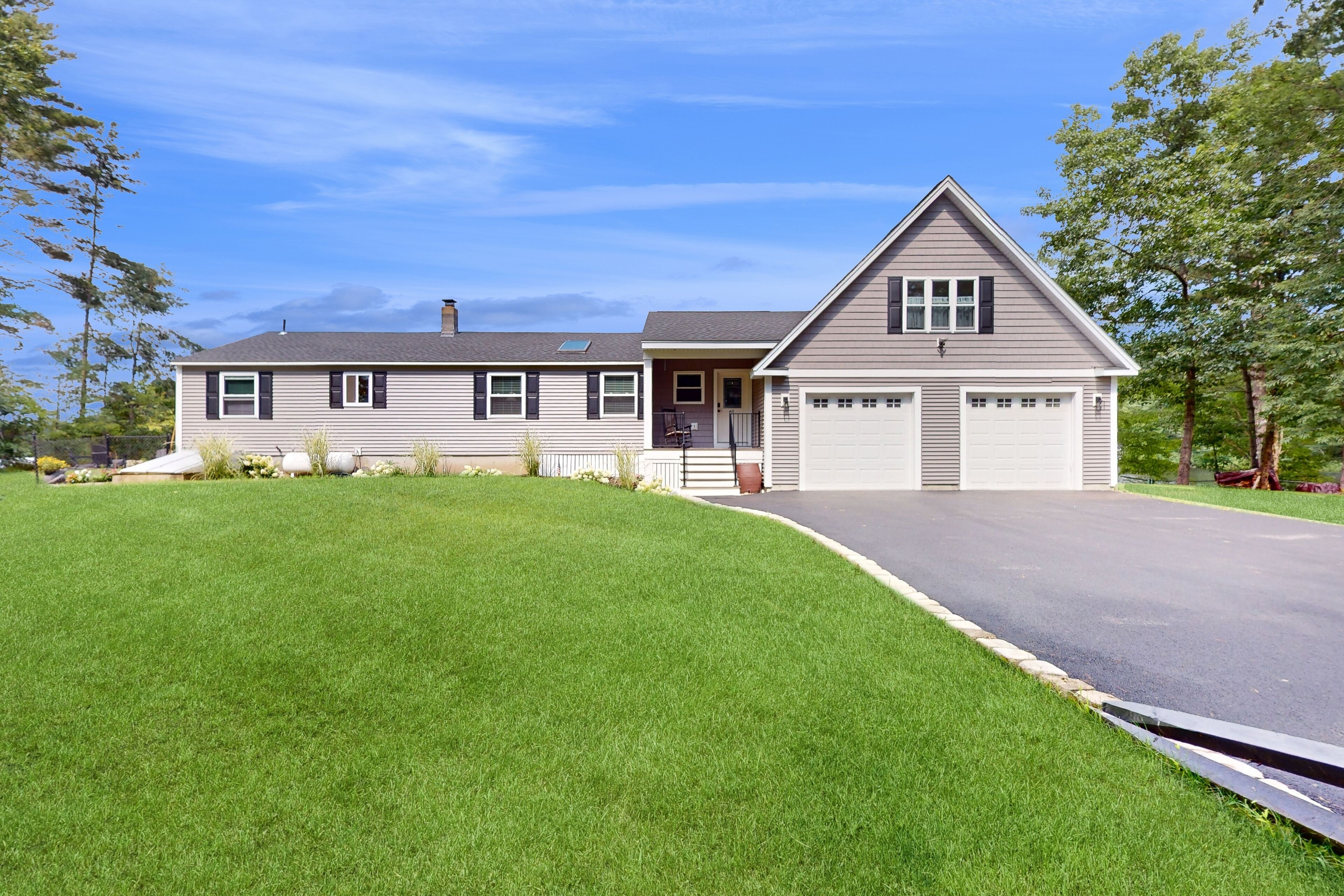 Idyllic & sunny lakefront home with large patio & views - near golf & skiing