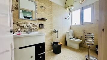 Shower, towels, soap, shampoo
