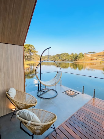Lake House for Couples with Panoramic View | Living area | Smart TV