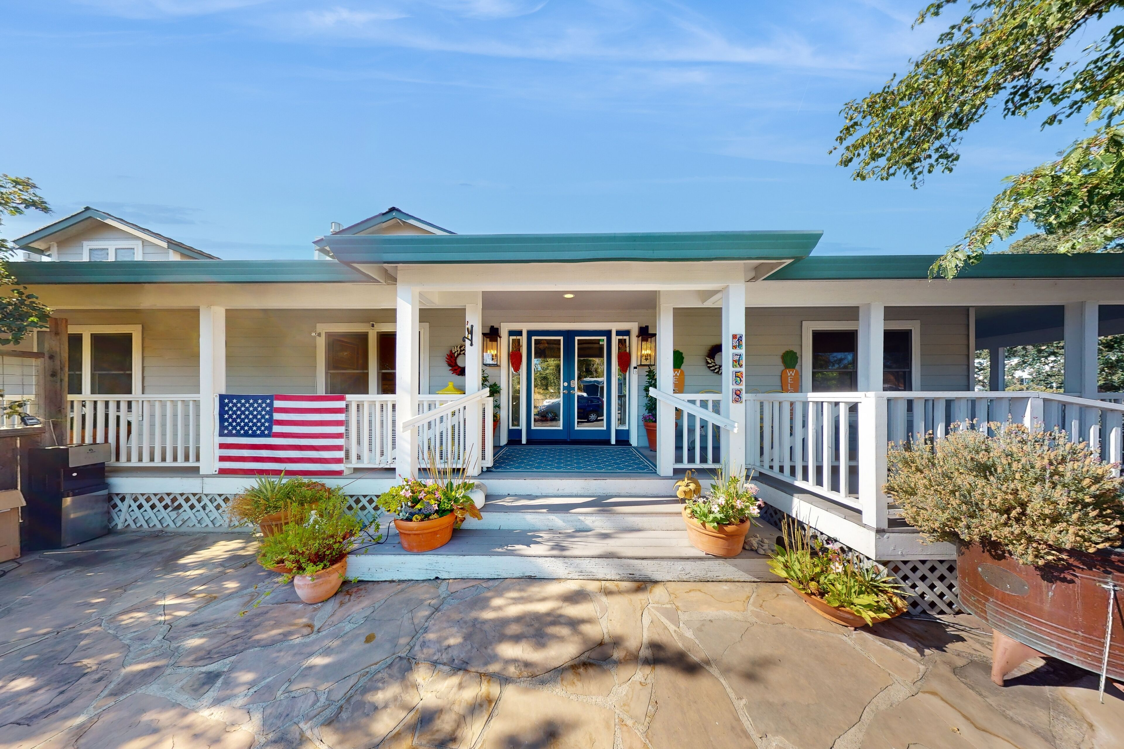 Beautifully renovated working ranch with pool, game tables, fireplaces, & AC