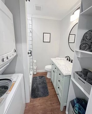 Shower, towels, toilet paper