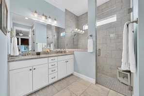 Shower, hair dryer, towels, soap