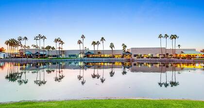 Ground-floor condo with on-site pool, pickleball, hot tub, gym & private balcony
