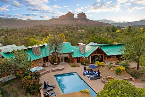 Relax by the sparkling pool with breathtaking views of Sedona's red rocks.