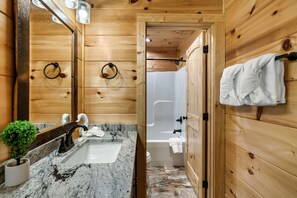 Shower, eco-friendly toiletries, hair dryer, towels
