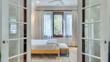 1 bedroom, desk, iron/ironing board, travel crib