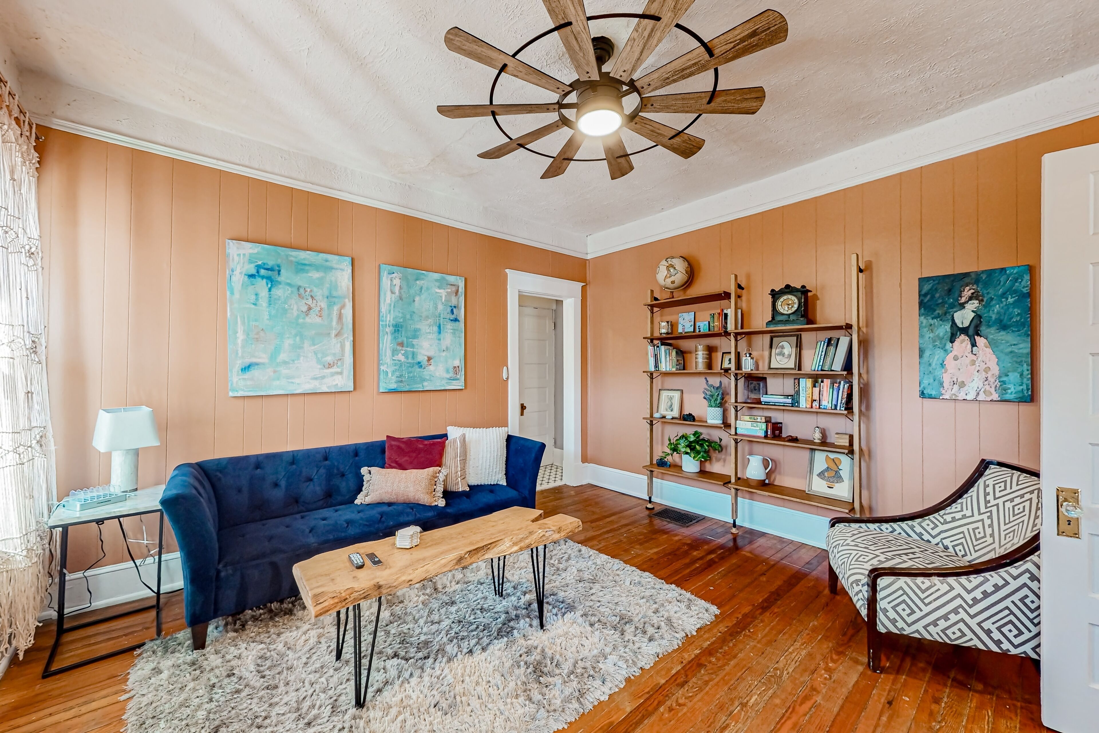 Art-filled duplex near the city with hardwood flooring, W/D, & AC - dog-friendly