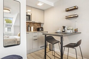 Fridge, microwave, coffee/tea maker, electric kettle