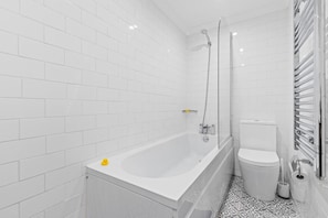 Hair dryer, towels, soap, shampoo