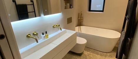 Shower, towels, soap, shampoo