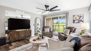 Condo, Multiple Beds, Balcony, Golf View (Catch the Sunrise) | Living area | 42-inch flat-screen TV with digital channels, fireplace