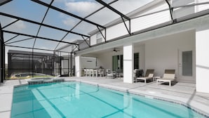 Une piscine intérieure moderne, avec une eau d’un bleu cristallin, entourée de murs blancs et surmontée d’un toit de verre.