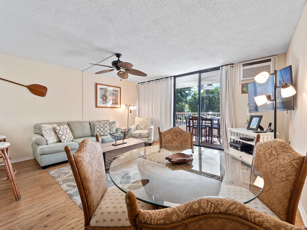 Condo, 1 King Bed, Balcony, Beach View | Living area | 50-inch flat-screen TV with cable channels, TV