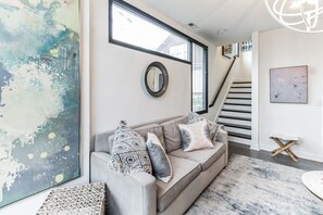 Condo, Multiple Beds, Patio, Garden View | Living area | TV - Music Row Duo (Nashville)