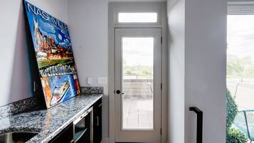 House, Multiple Beds, Balcony, City View | Private kitchen | Fridge, microwave, oven, stovetop