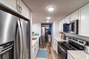 Condo, Multiple Beds, Balcony (Lazy L at the Lake) | Private kitchen | Fridge, microwave, oven, stovetop
