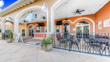 Townhome, Multiple Beds, Patio, Garden View (Regal Palms Tropic Escape) | Outdoor dining