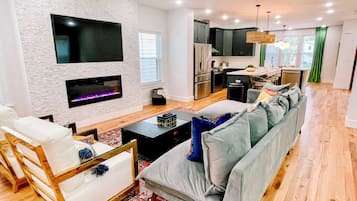 House, Multiple Beds, Pool Access, City View | Living area | TV, fireplace