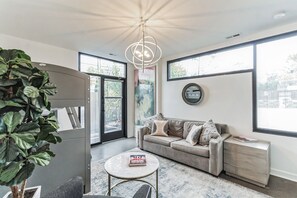 Condo, Multiple Beds, Kitchen, City View | Living area | TV - Music Row Escape (Nashville)
