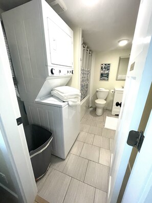 Hair dryer, towels, soap, shampoo