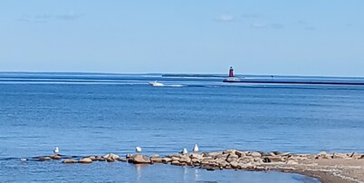 30' CARVER BOAT DOCKED AT MENOMINEE MARINA IN HISTORIC DOWNTOWN MENOMINE MI.