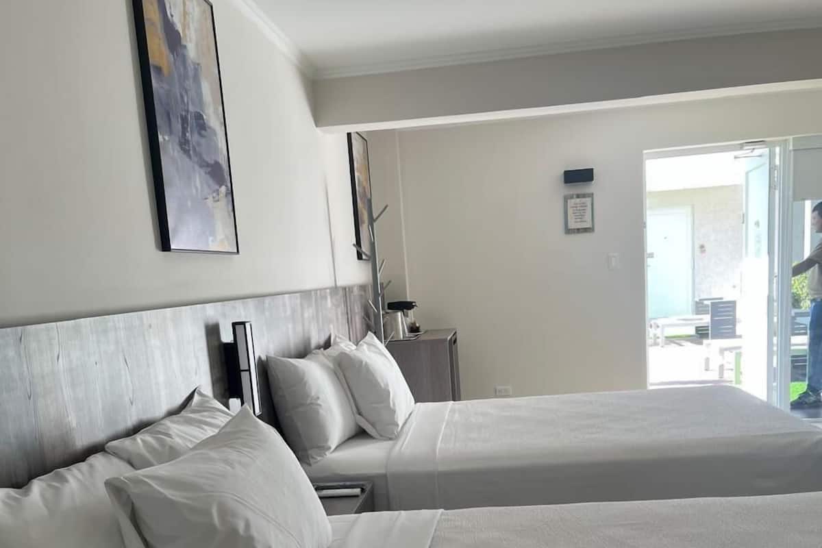 Standard Room, 2 Double Beds, Non Smoking, Pool View | 1 bedroom, in-room safe, desk, blackout drapes