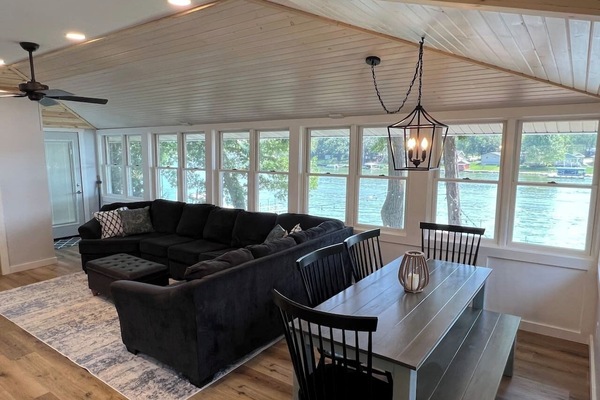 Family room and eating area space overlooking the water.