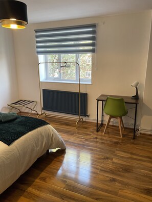 2 dormitorios, tabla de planchar con plancha, wifi gratis y ropa de cama