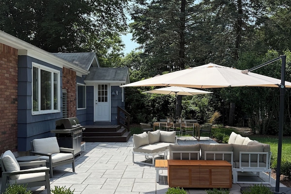 Backyard, with outdoor seating + dining table that seats eight. Fully fenced in.