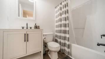 Hair dryer, towels, soap, toilet paper