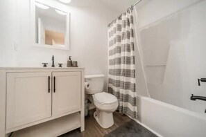 Hair dryer, towels, soap, toilet paper