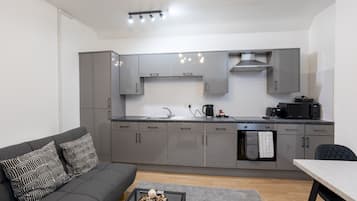 Apartment | Private kitchen | Full-sized fridge, microwave, oven, stovetop