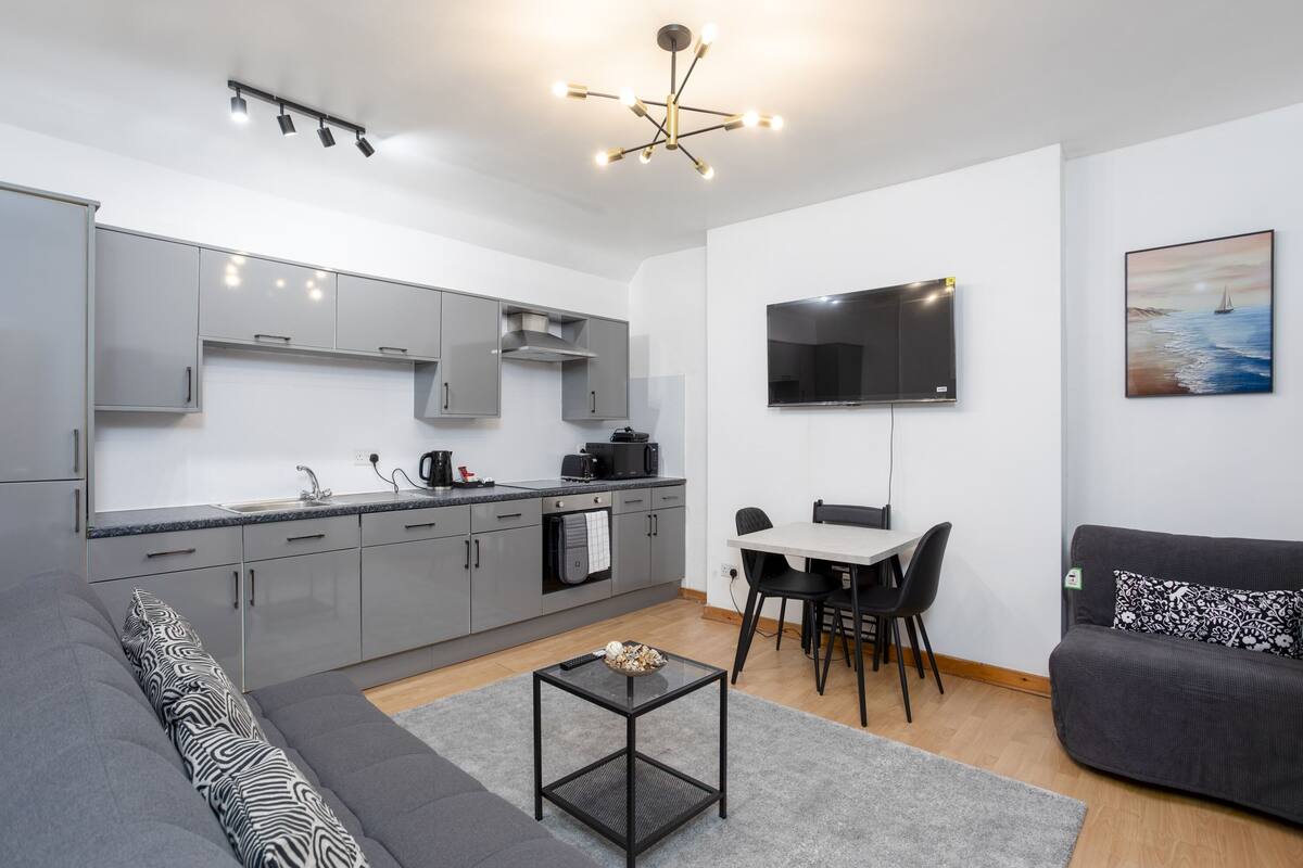 Apartment | Living area | 50-inch Smart TV with digital channels, Netflix, streaming services