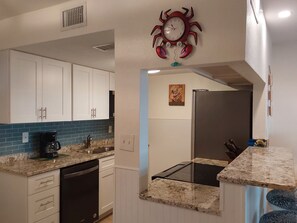 Fridge, microwave, oven, stovetop - Couples Retreat! Treasure Island Waterfrt Condo Beach,shops, dining/John's Pass (Treasure Island)