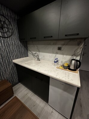 Habitación Confort | Cocina privada