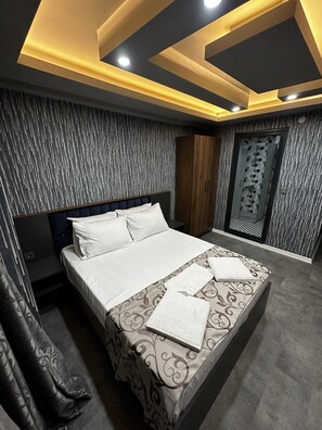 Habitación económica | Sábanas de algodón egipcio y ropa de cama de alta calidad