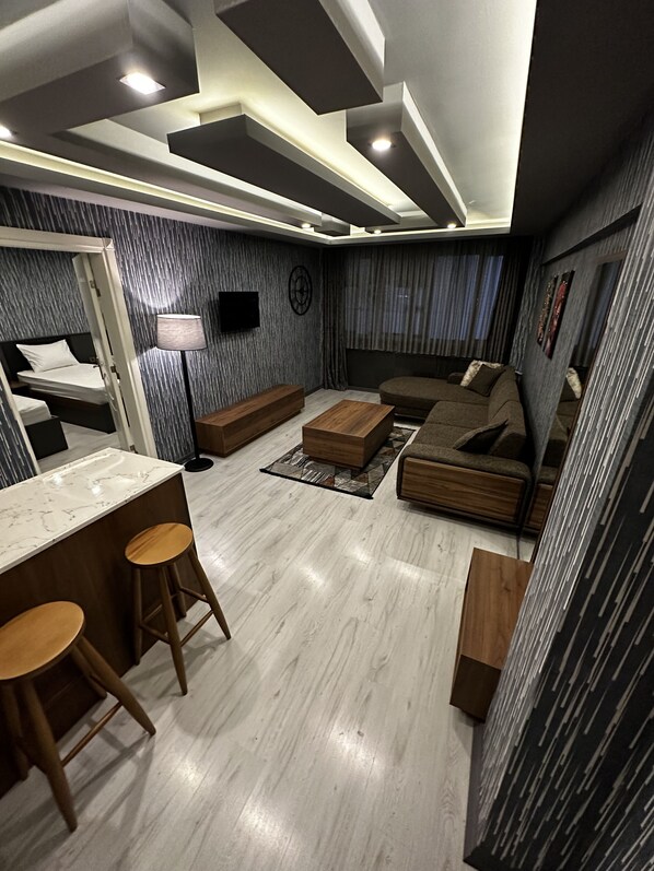 Habitación familiar | Sábanas de algodón egipcio y ropa de cama de alta calidad