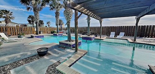 Mustang Isle Beach Bungalow #2 by Silver Sands Vacation Rentals