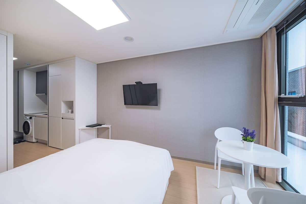 Premium bedding, pillow-top beds, blackout curtains, free WiFi